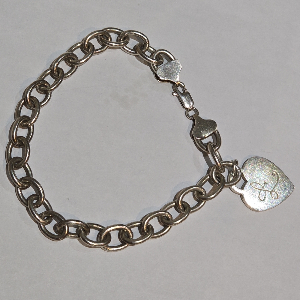 925 sterling silver bracelet with heart charm